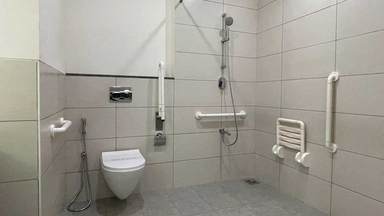 Shower Seat and Grab Bars in the Primary Washroom